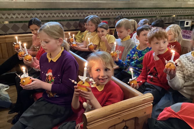 St Matthew's CE Primary School Christingle service, St Matthew's Church, Blackmoor, December 2022.