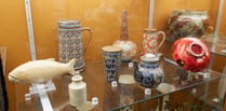 Researchers looking at ceramics collection at Allen Gallery in Alton