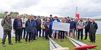 Frensham RC sailors negotiated choppy waters to deliver charity cheque