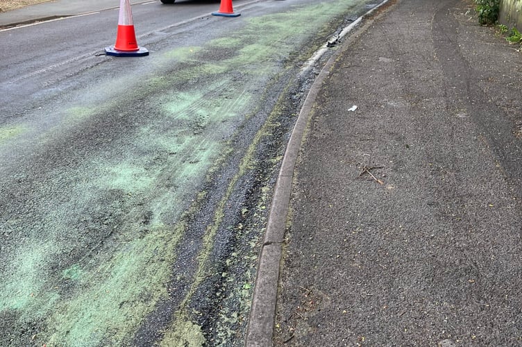 A lane of the A287 Upper Hale Road is currently closed after a huge spill of cooking oil on Wednesday