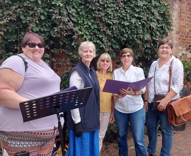 Choir gets Lion & Lamb Yard dancing with impromptu concert