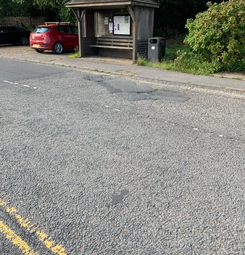 The badly repaired road where a 97-year-old tripped and badly injured herself in Grayswood