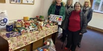 Exercise group makes (keep) fitting donation to Liss Food Bank