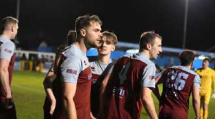 Farnham Town celebrate Harry Cooksley’s winning goal against Jersey Bulls, February 24th 2024.