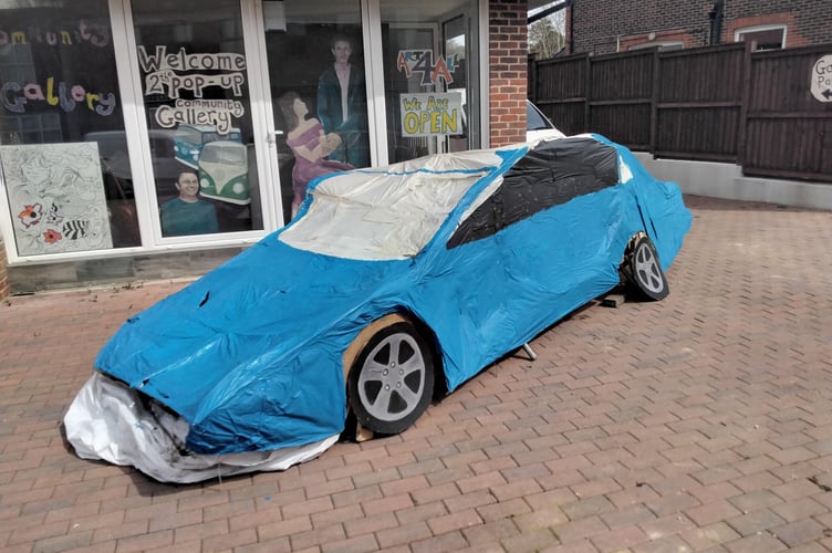 Cardboard car made by Sarah and the team.