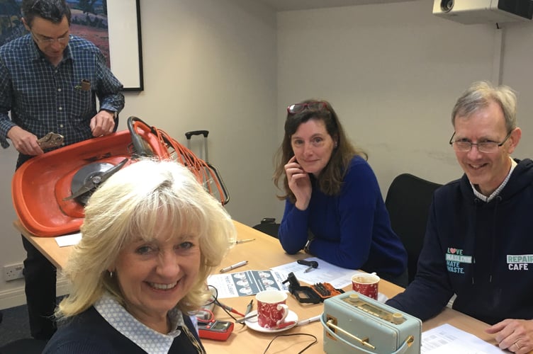 Sandy Pollock, Helen Cussen, Eric Willner and Erica Vandersteen with her broken Roberts Radio.