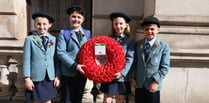 Haslemere school pupils lay wreath at the Cenotaph on St George's Day