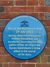 The memorial blue plaque erected at Haslemere Town Hall