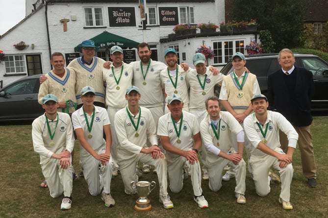 I'Anson Cricket League president Keith Ellis (back row, right) with Division One champions Tilford