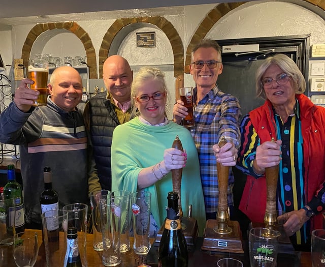 Glasses raised after villagers buy their local