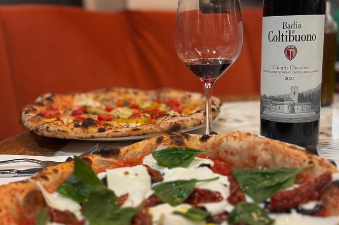 Guido's Craft pizzas with wine from Guido's own vineyard